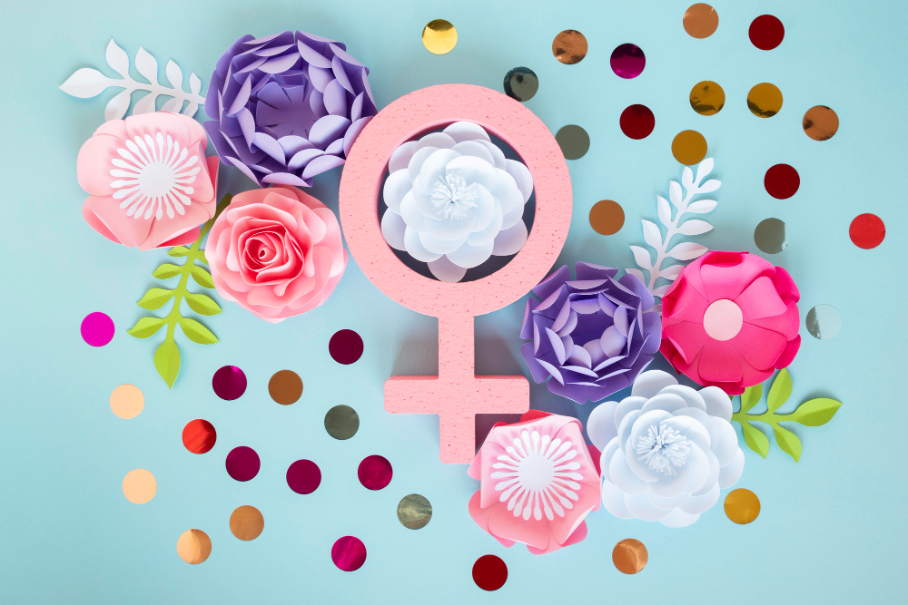 top view of flowers with female symbol for women s day